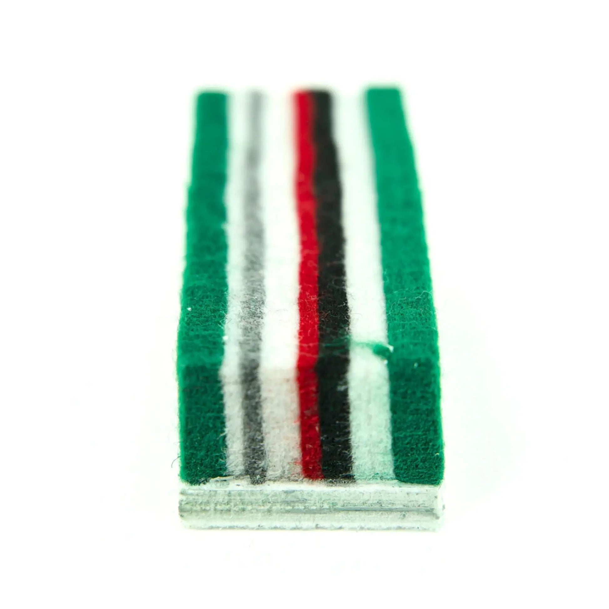 Striped towel with green, red, black, and white colors on a white background