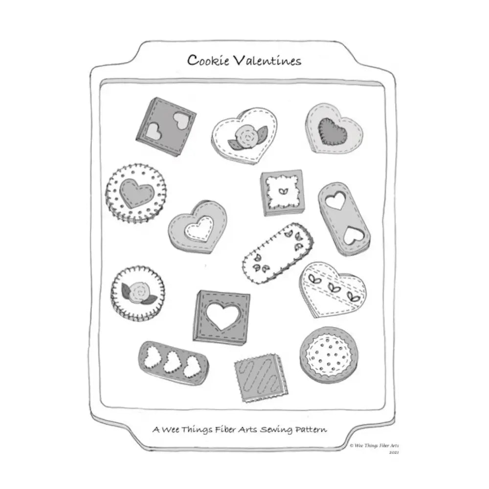 Valentine's Day cookie pattern on a baking sheet with 'Cookie Valentines' text.