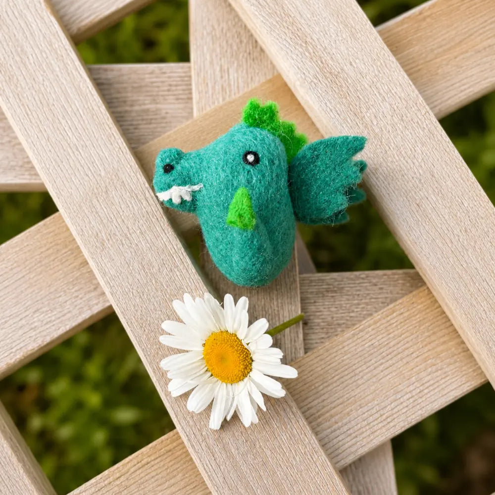 Hand-felted wool dragon storytelling toy for fairy tale play, small world scenes, and Waldorf-inspired imaginative play.