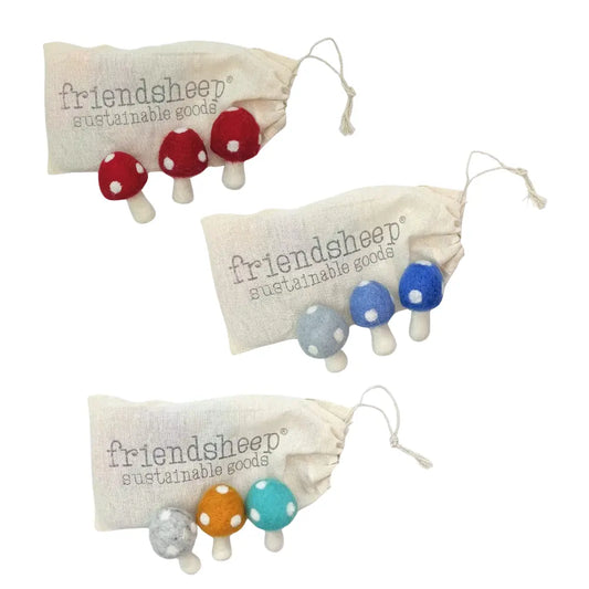Set of colorful mushroom-shaped toys with 'friendsheep' branding on a white background