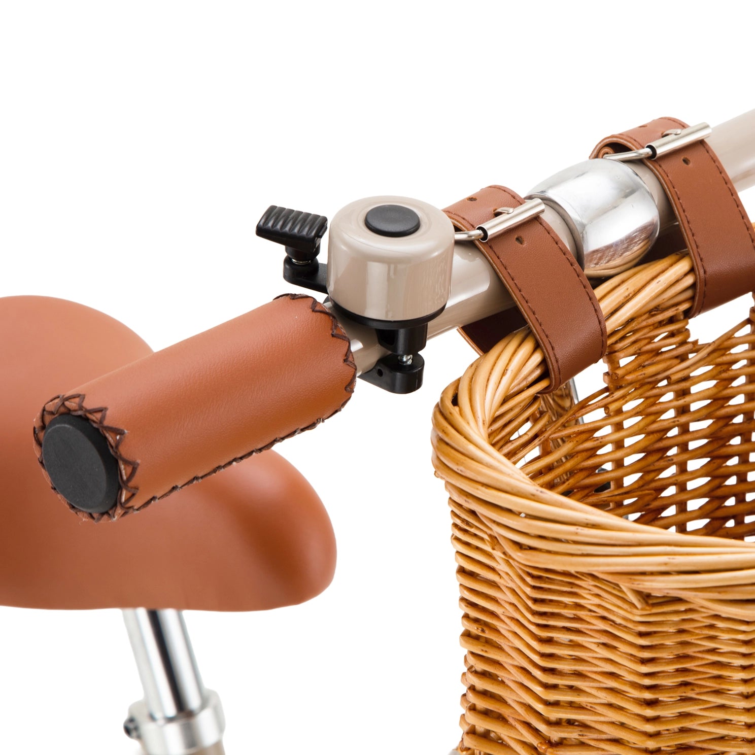 Close-up of a bicycle handlebar with brown leather grips and a wicker basket on a white background