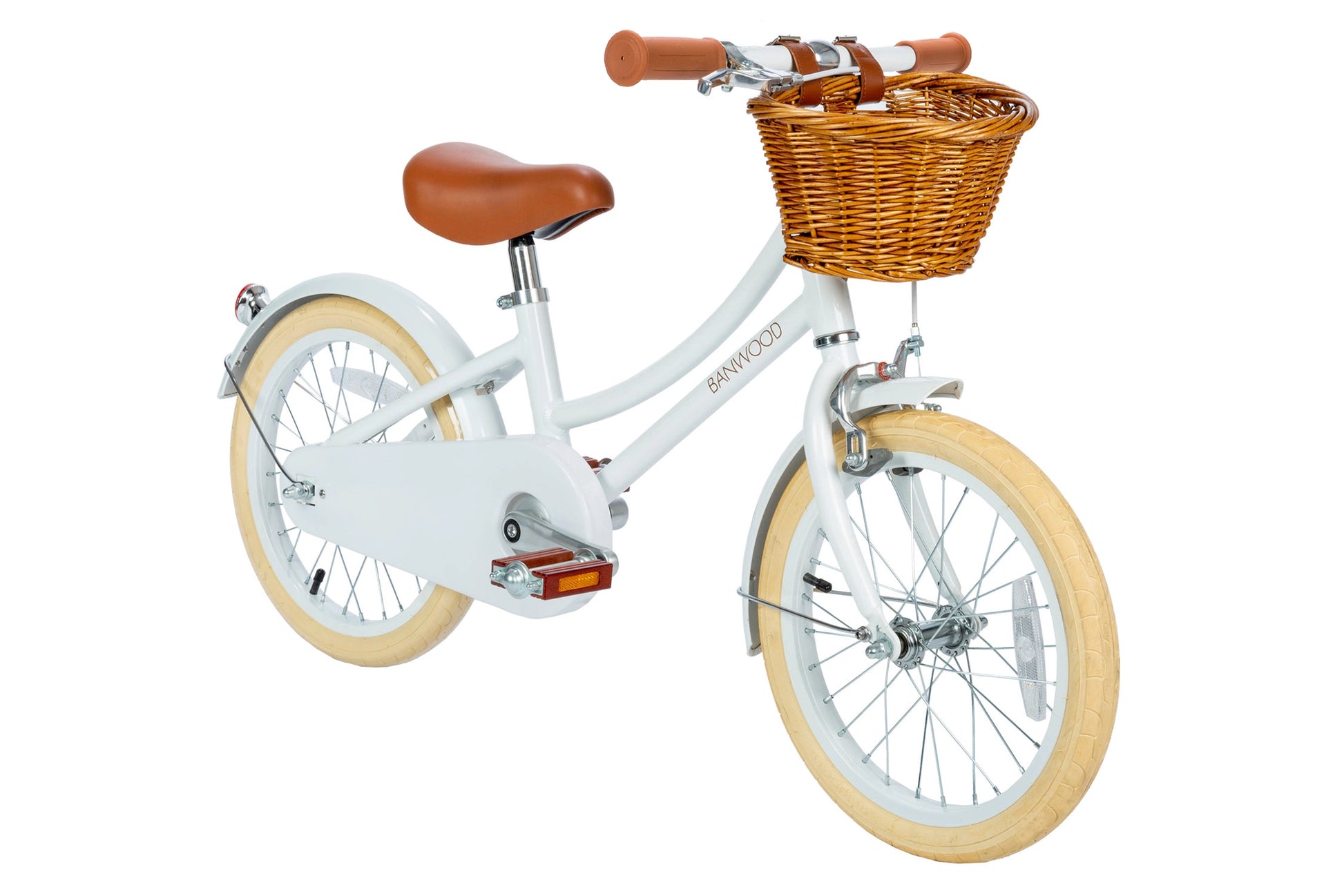 White 16 inch children's bicycle with a wicker basket on a white background
