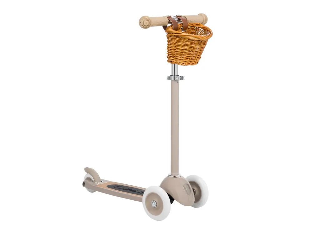 Beige scooter with a wicker basket on a white background