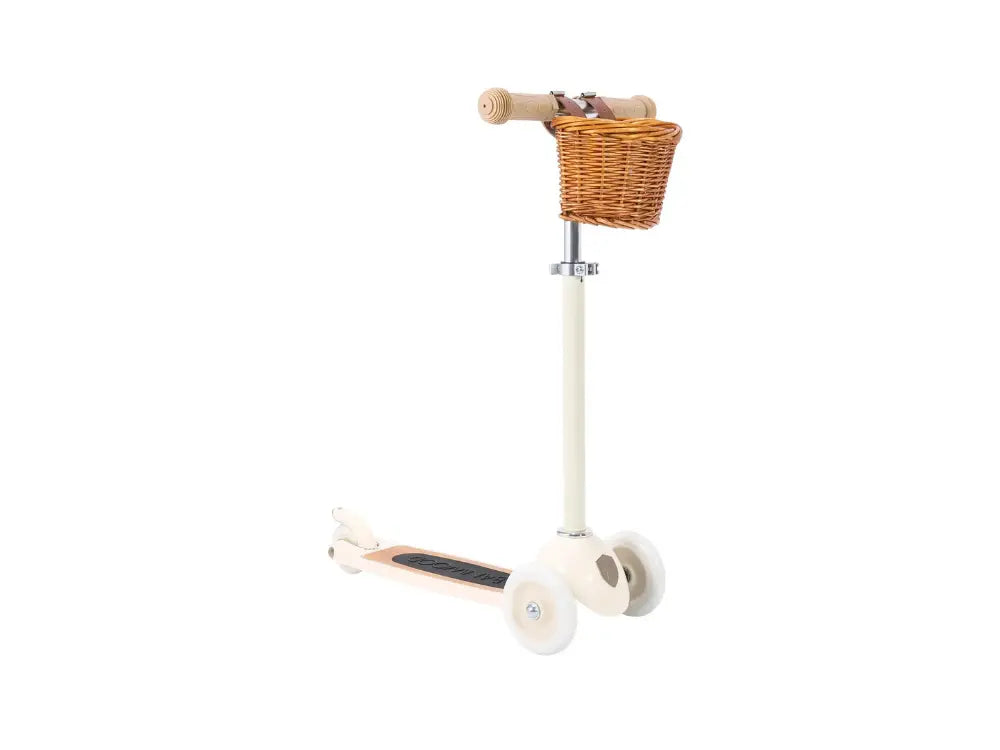 Children's scooter with a basket on a white background