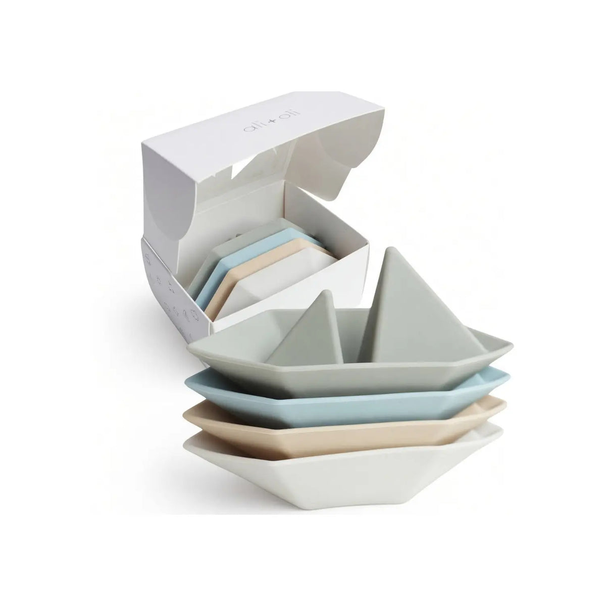 Open gift box with four pastel silicone floating boat bath toys stacked together.