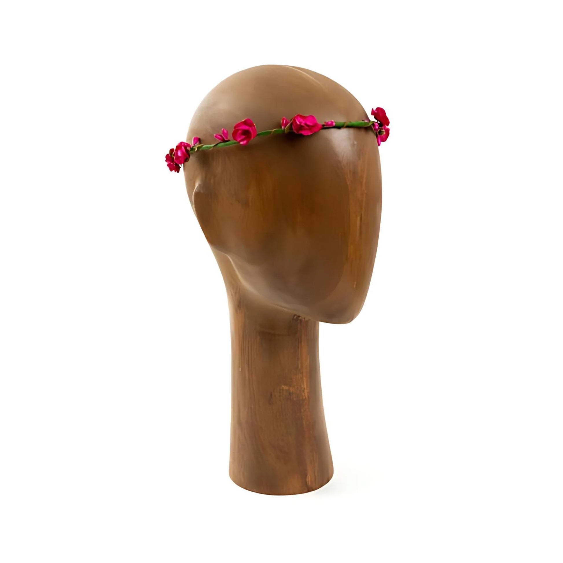 Red flower crown on wooden mannequin on white background