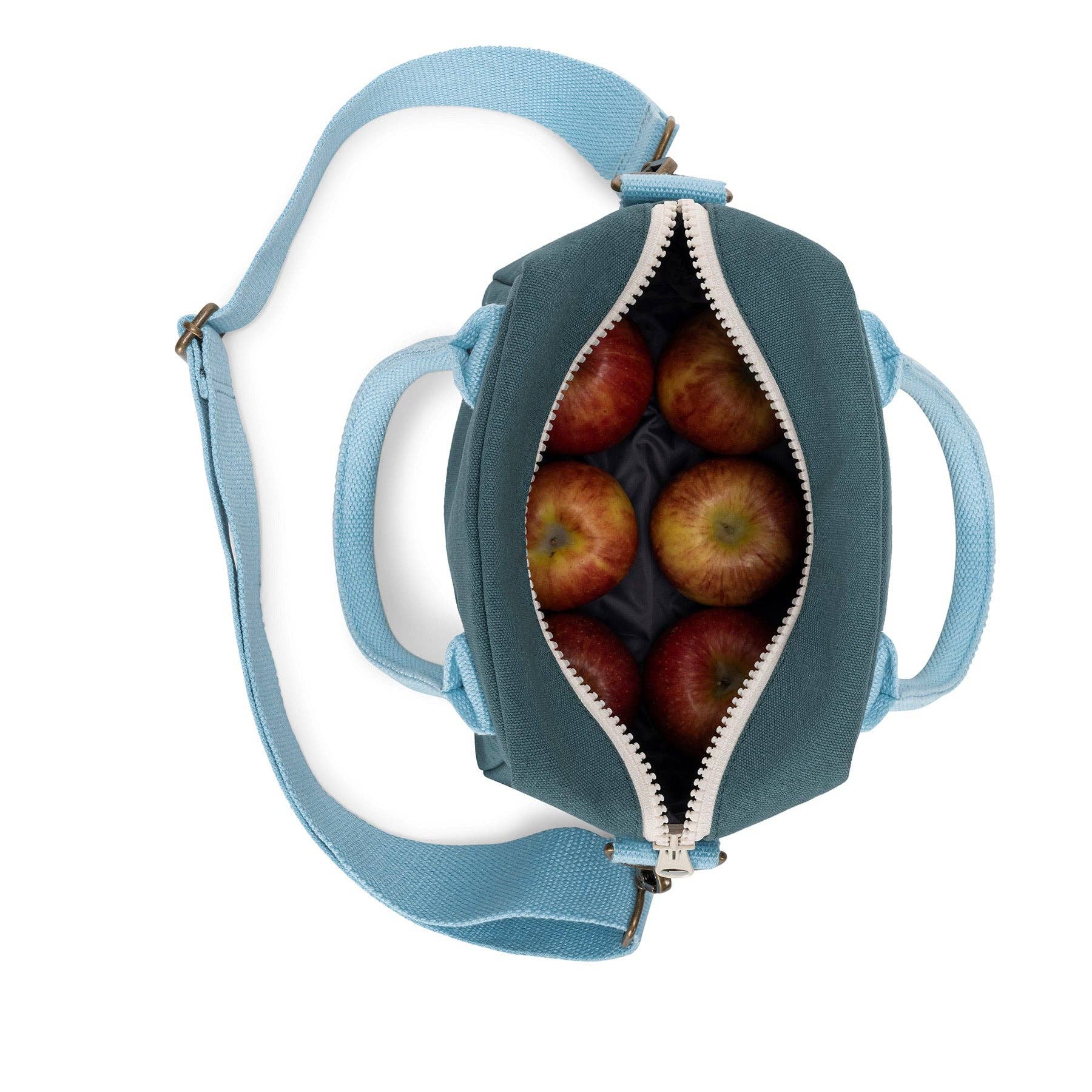 Open Fluf Cypress organic cotton insulated lunch bag filled with apples