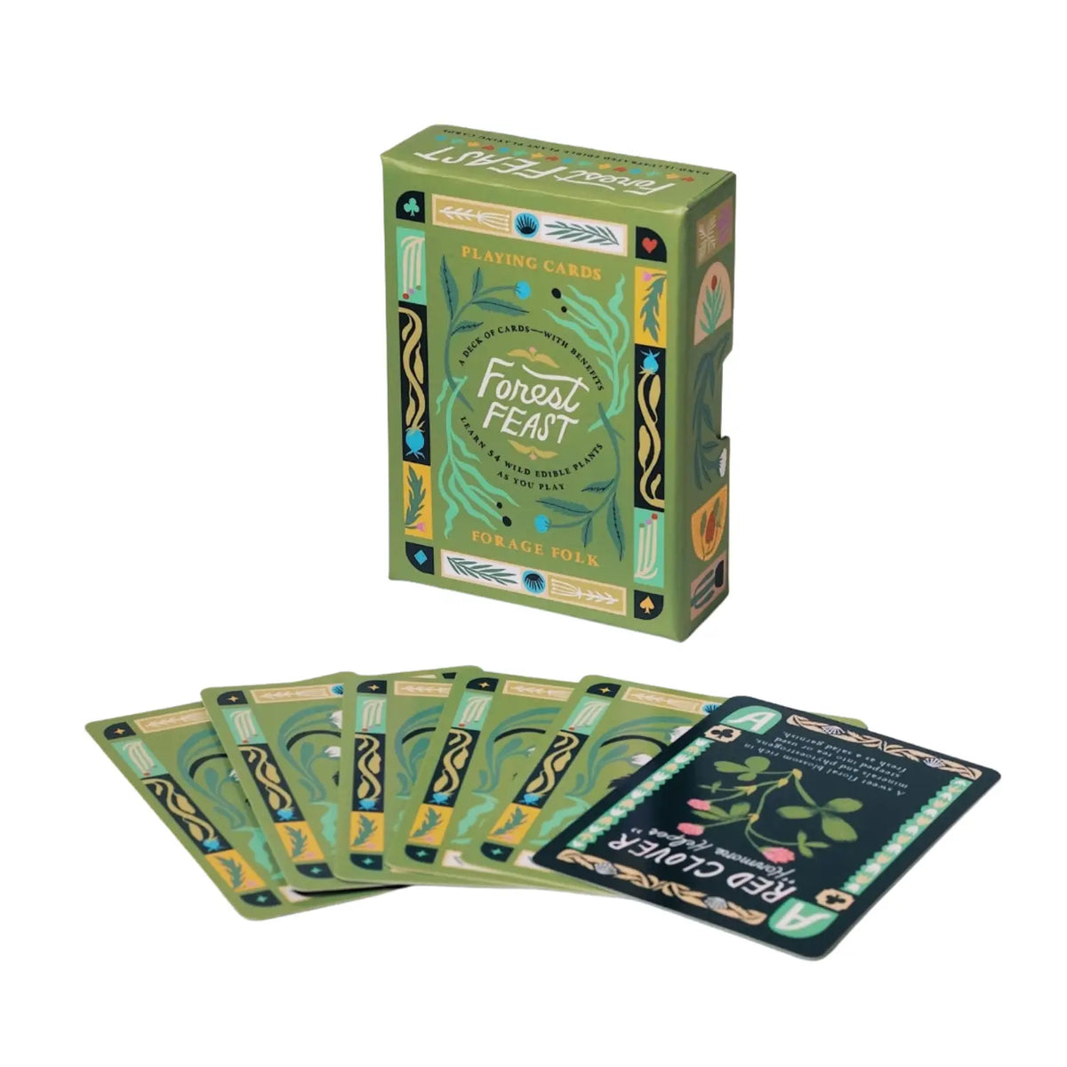 Standing Forest Feast box behind fanned botanical card backs and a face-up Red Clover card.