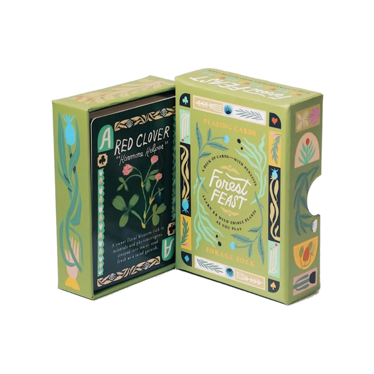 Open Forest Feast playing card box displaying the illustrated Red Clover card beside its botanical sleeve.