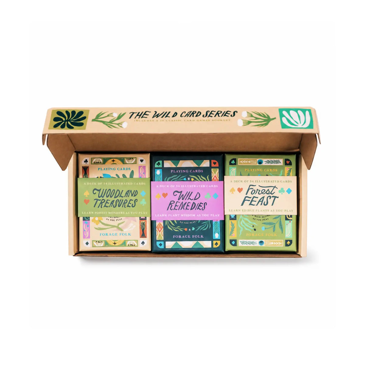 An open cardboard gift box labeled 'THE WILD CARD SERIES' containing three colorful card packs  