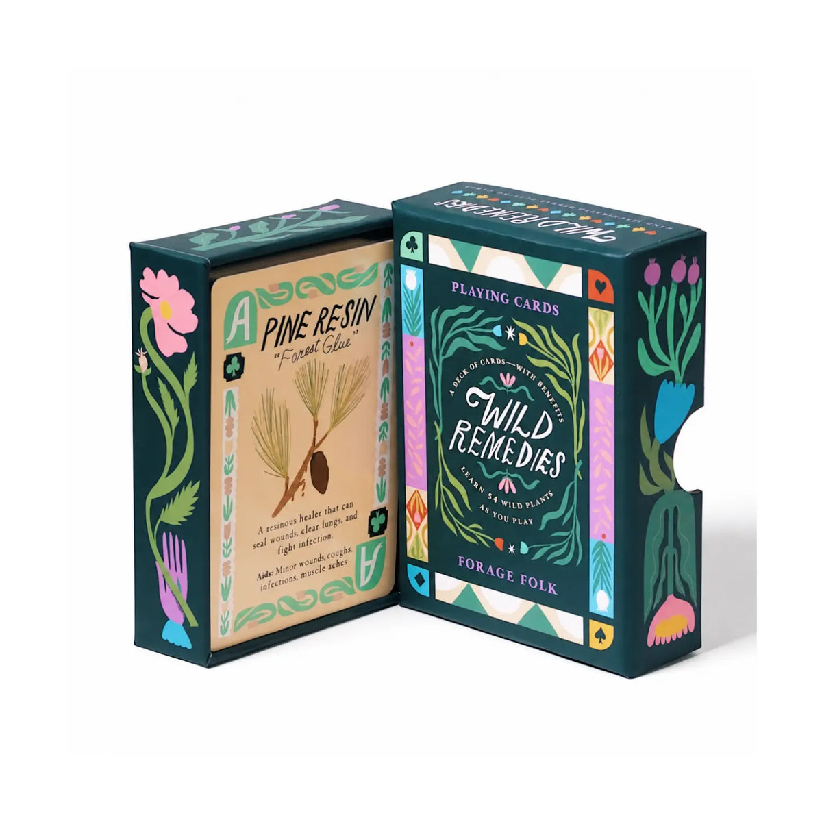 Open Wild Remedies playing card box displaying the illustrated Pine Resin card beside its botanical sleeve