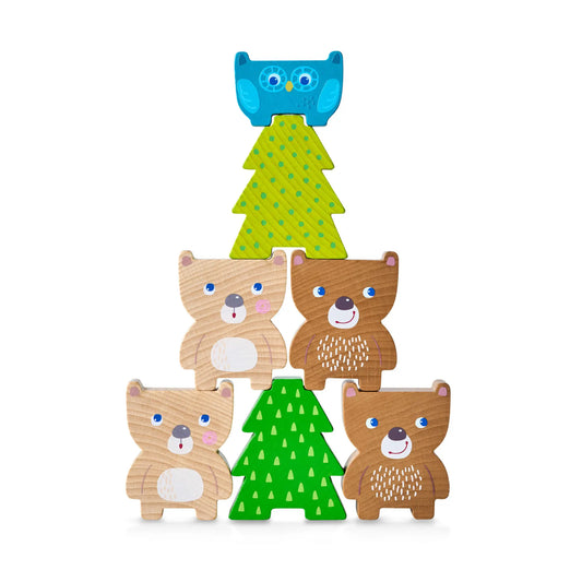Wooden toy set with bears, trees, and an owl on a white background