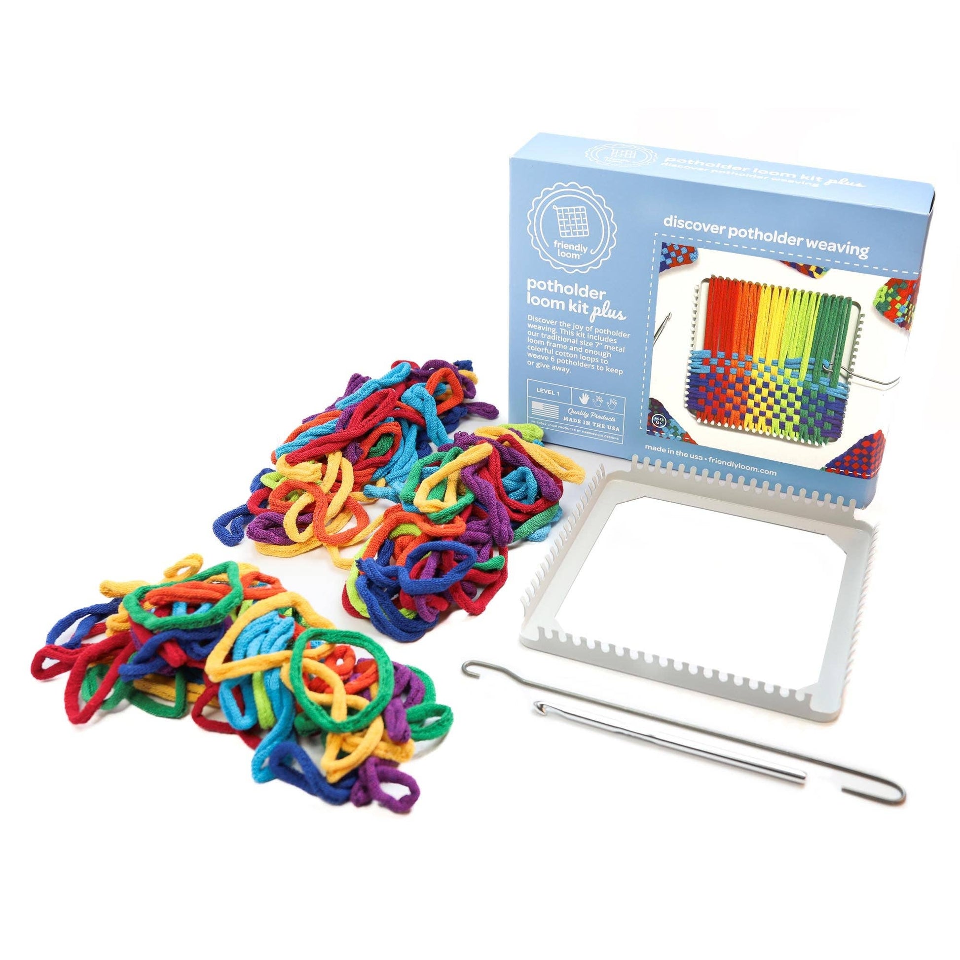 Friendly Loom potholder loom kit contents with metal loom, cotton loops, weaving hooks, instructions, and box