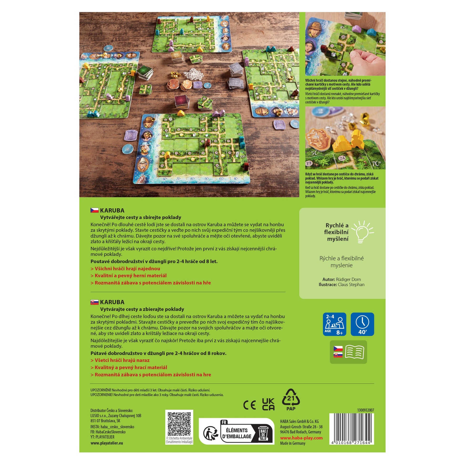 Board game packaging with game pieces and instructions on a wooden surface