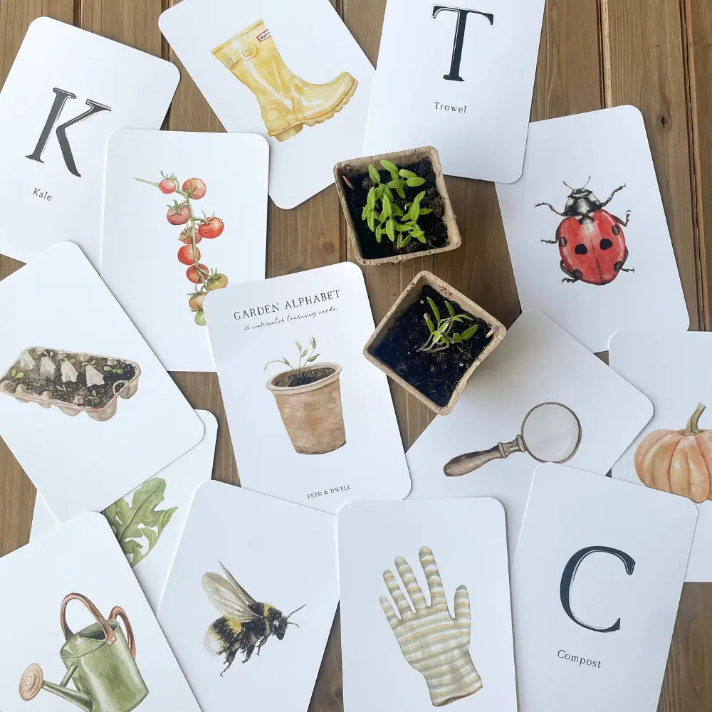 Garden alphabet cards spread showing letters and nature-themed illustrations