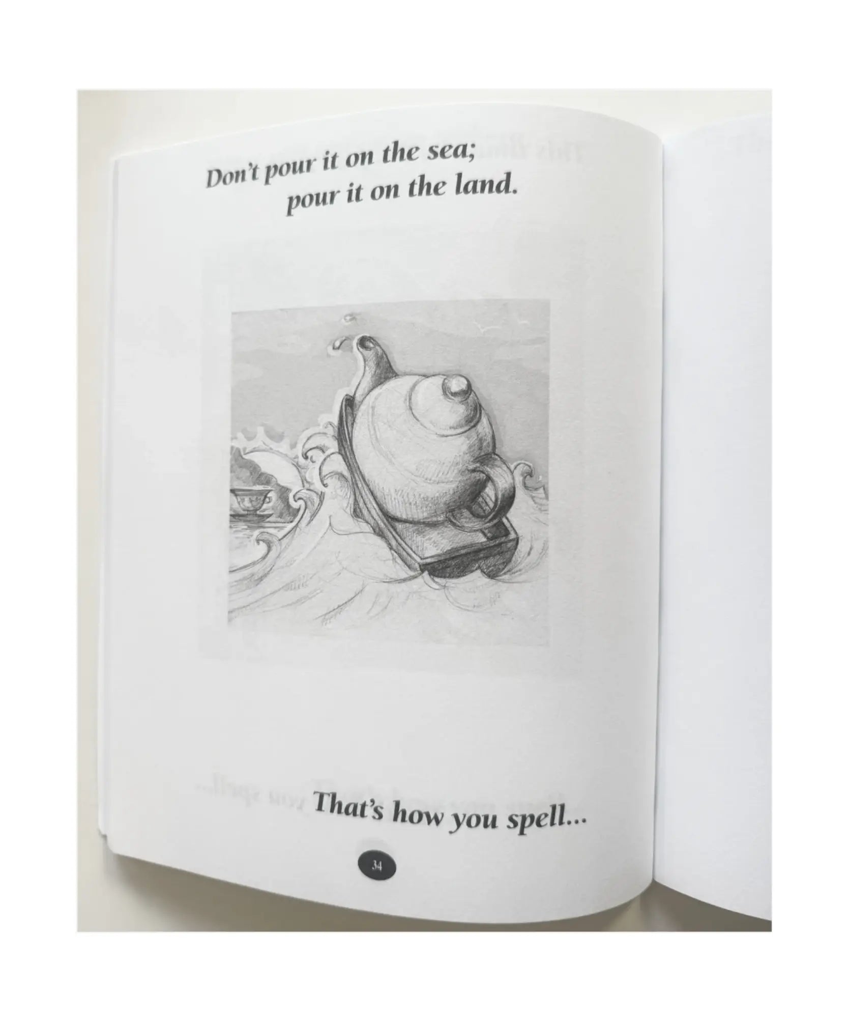 Open geography riddle book with a black and white illustration of a snail and text on a white background