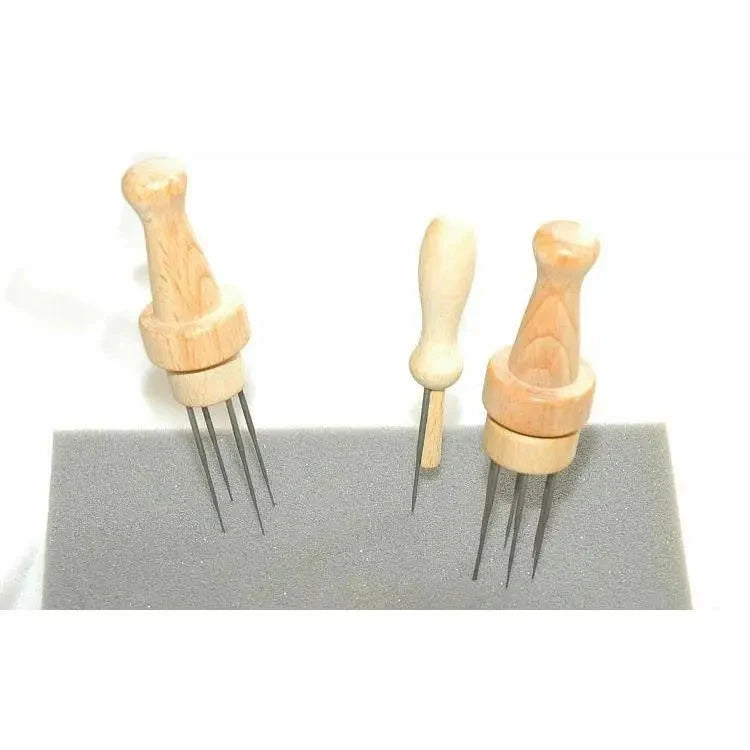 three wooden felting needle holders with felting needles
