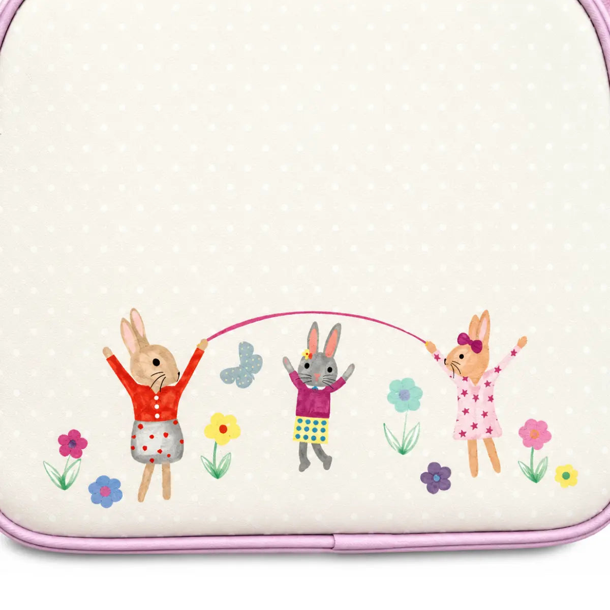 Three rabbits playing jump rope among flowers on the back of the girls lunch bag
