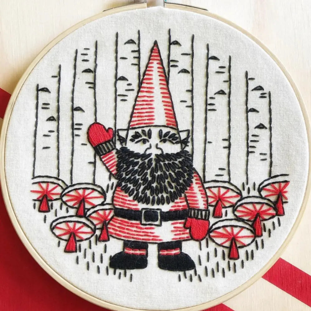 Finished beginner gnome embroidery hoop with mushrooms and woodland design