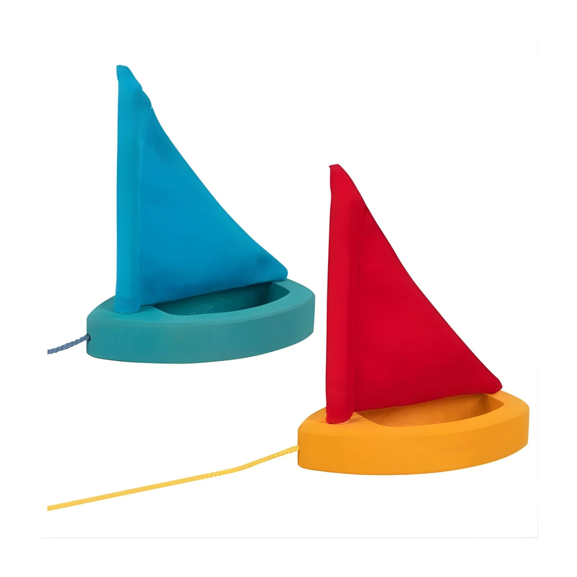 Two toy sailboats by goki on a white background - one with a red sail and yellow boat and another with a blue sail and teal boat