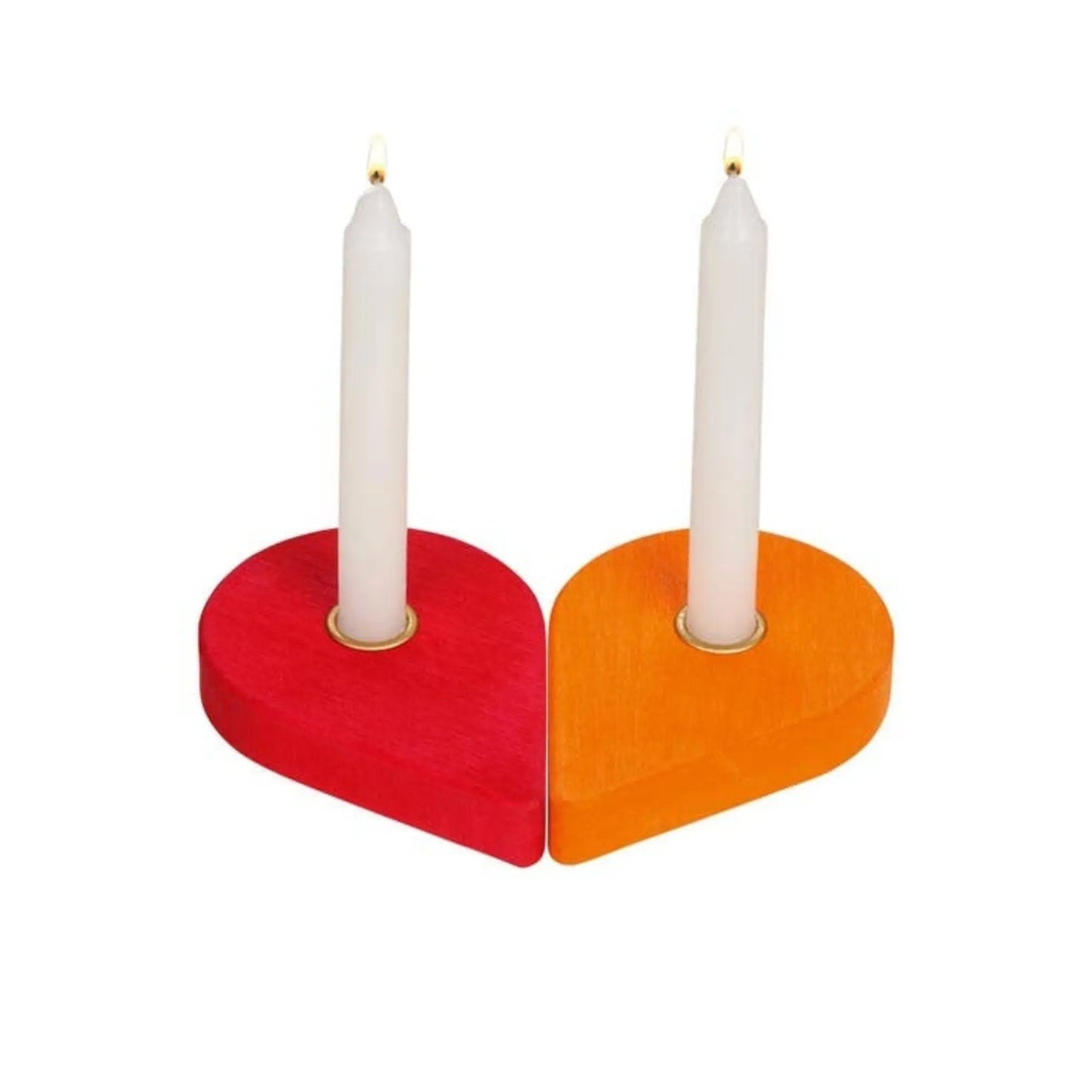 Two heart-shaped candle holders, one red and one orange, with white candles on a white background.
