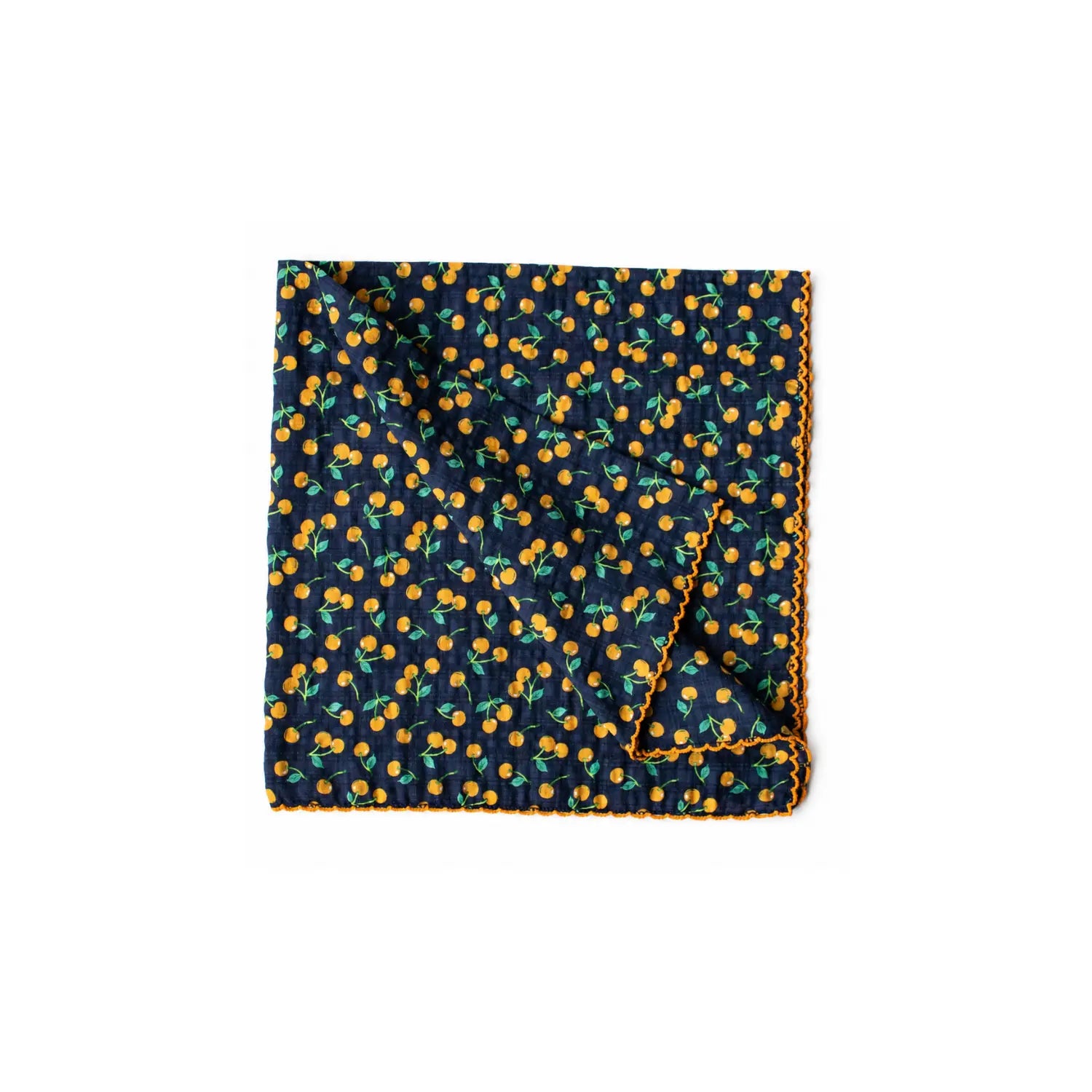 Golden Cherry reusable lunch napkin in navy blue with a small golden cherry print and orange decorative edging on a white background