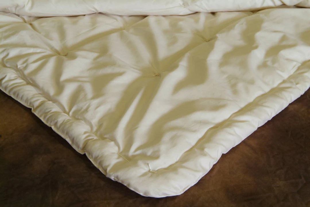 GOTS certified wool comforter laid flat showing stitched quilting and even wool distribution