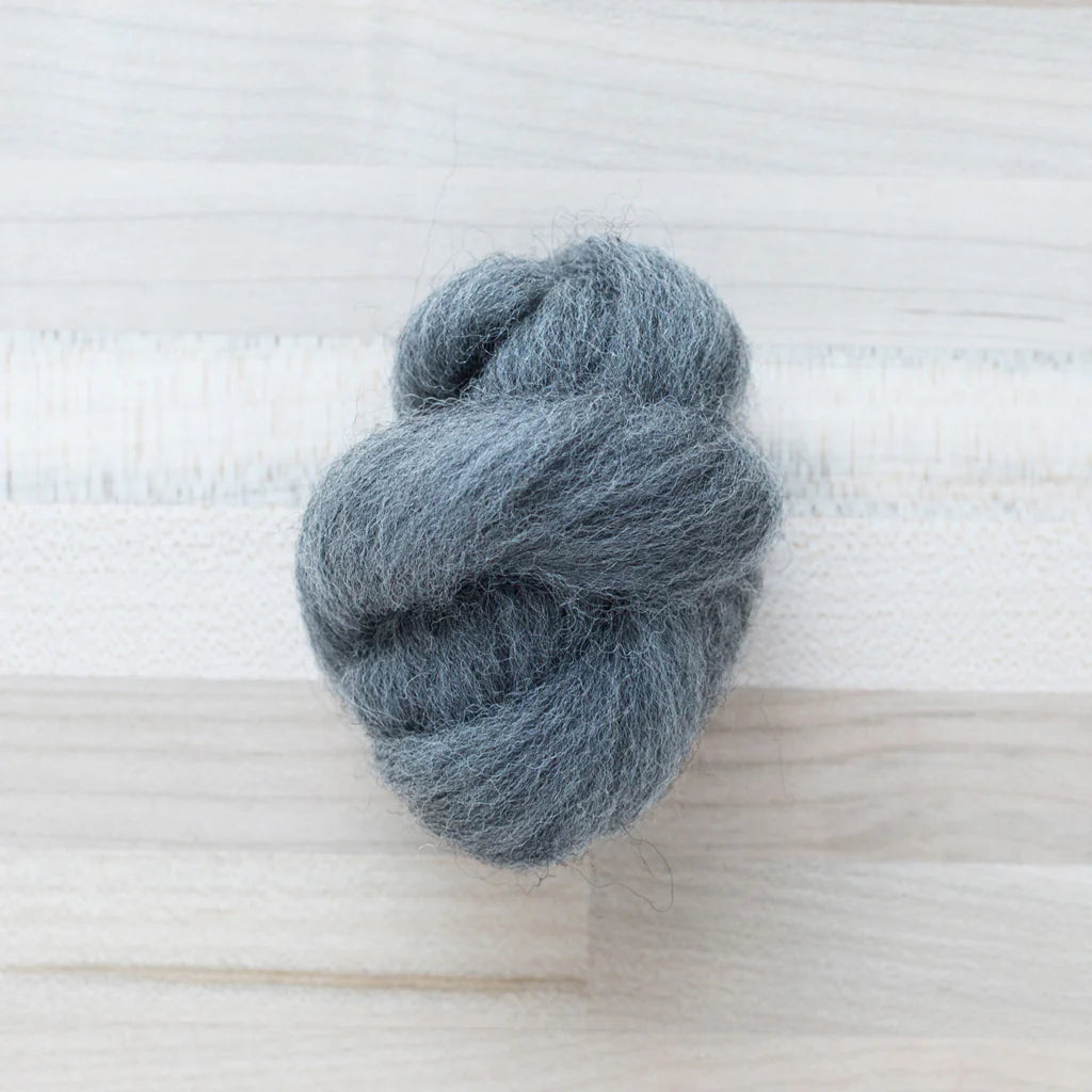 Graphite Gray Wool Roving Felter's Flowing on tabletop