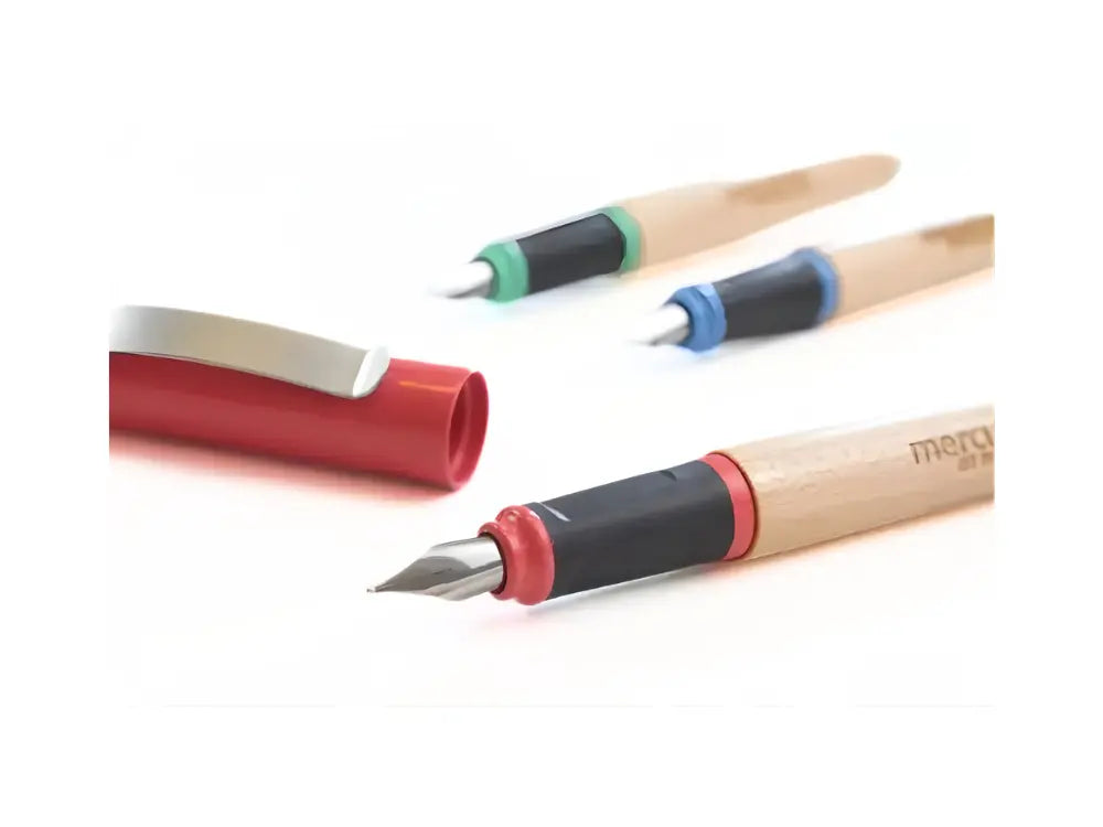 Set of greenfield fountain pens with various nibs on a white background