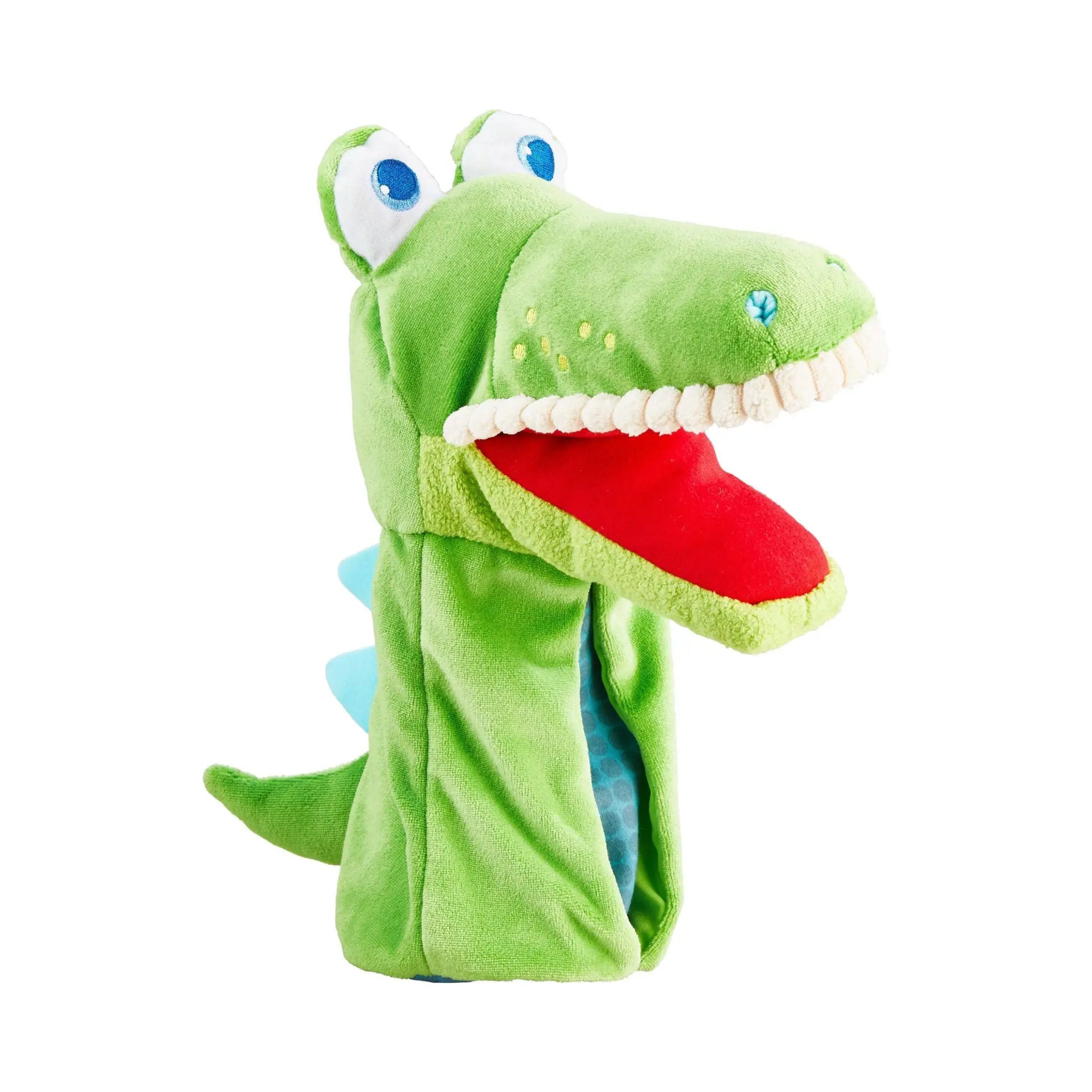 Green children's hand puppet of a crocodile with a red mouth on a white background