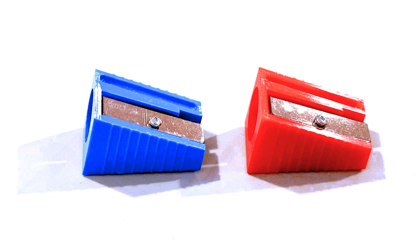 Two crayon sharpeners, one blue and one red, on a white background.