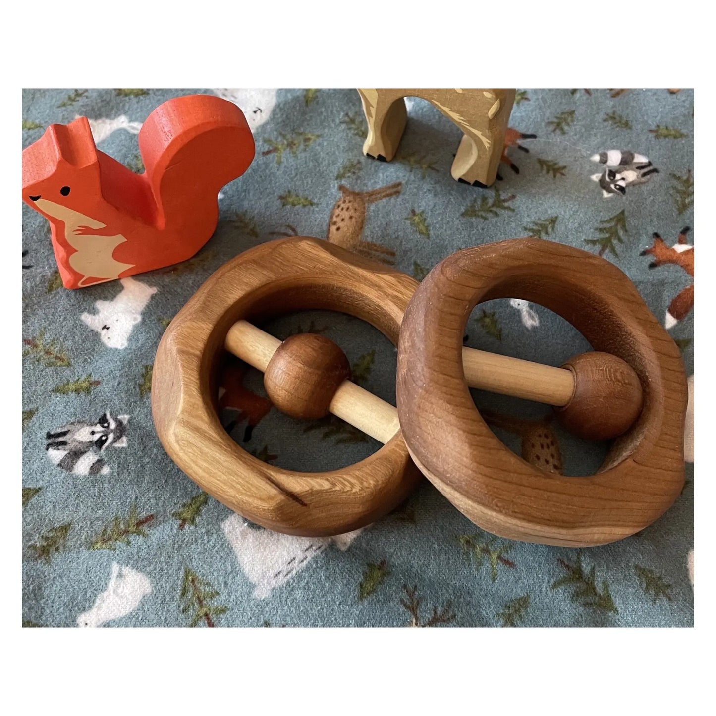 Handcrafted wooden baby rattles with gentle rattle bead