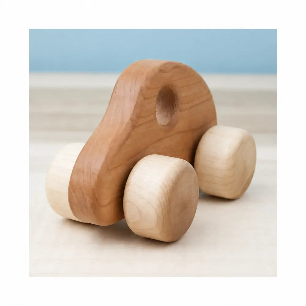 Wooden car showing smooth cherry wood body and easy-grip window
