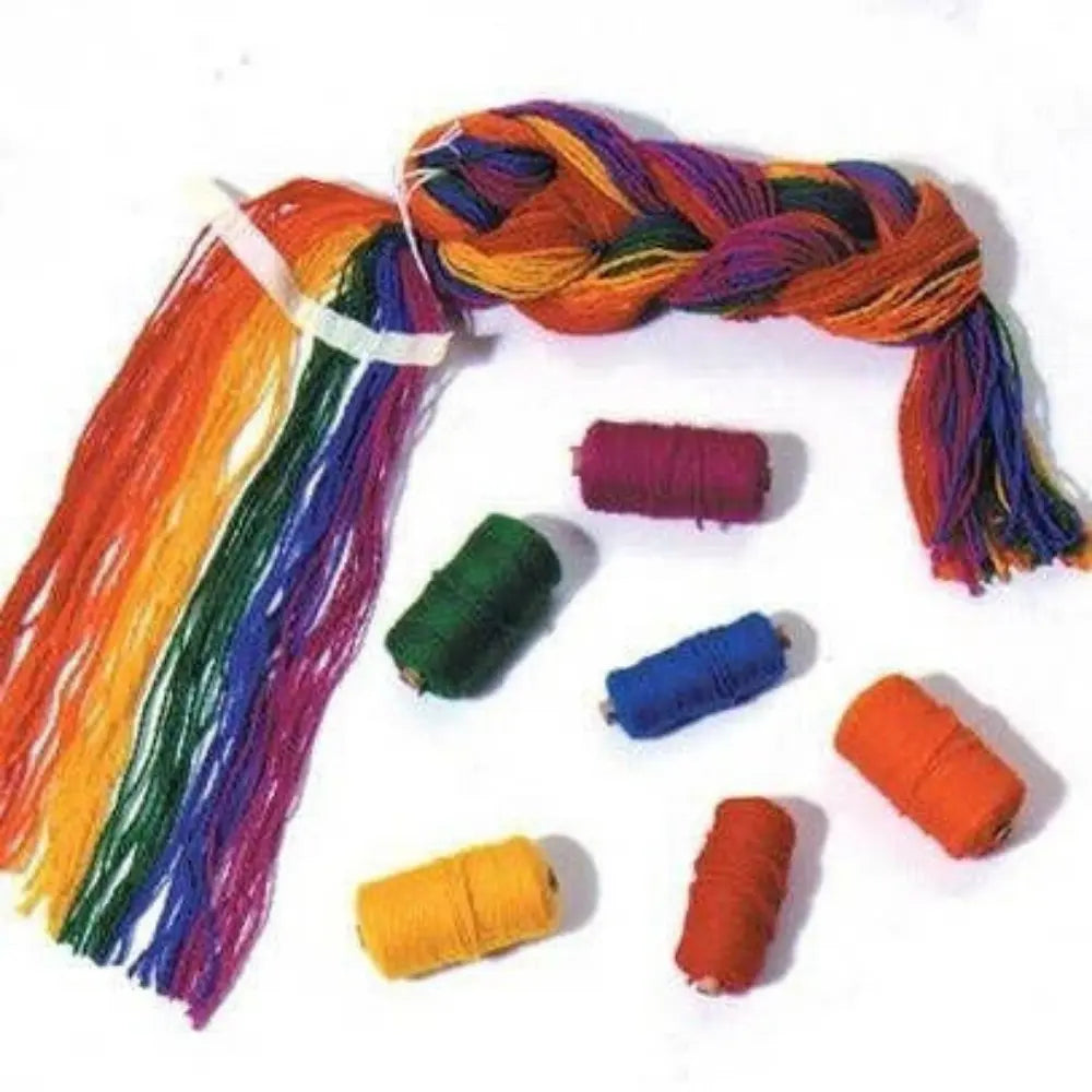 Colorful wool rainbow yarn for rigid heddle loom with separate colored strands on a white background