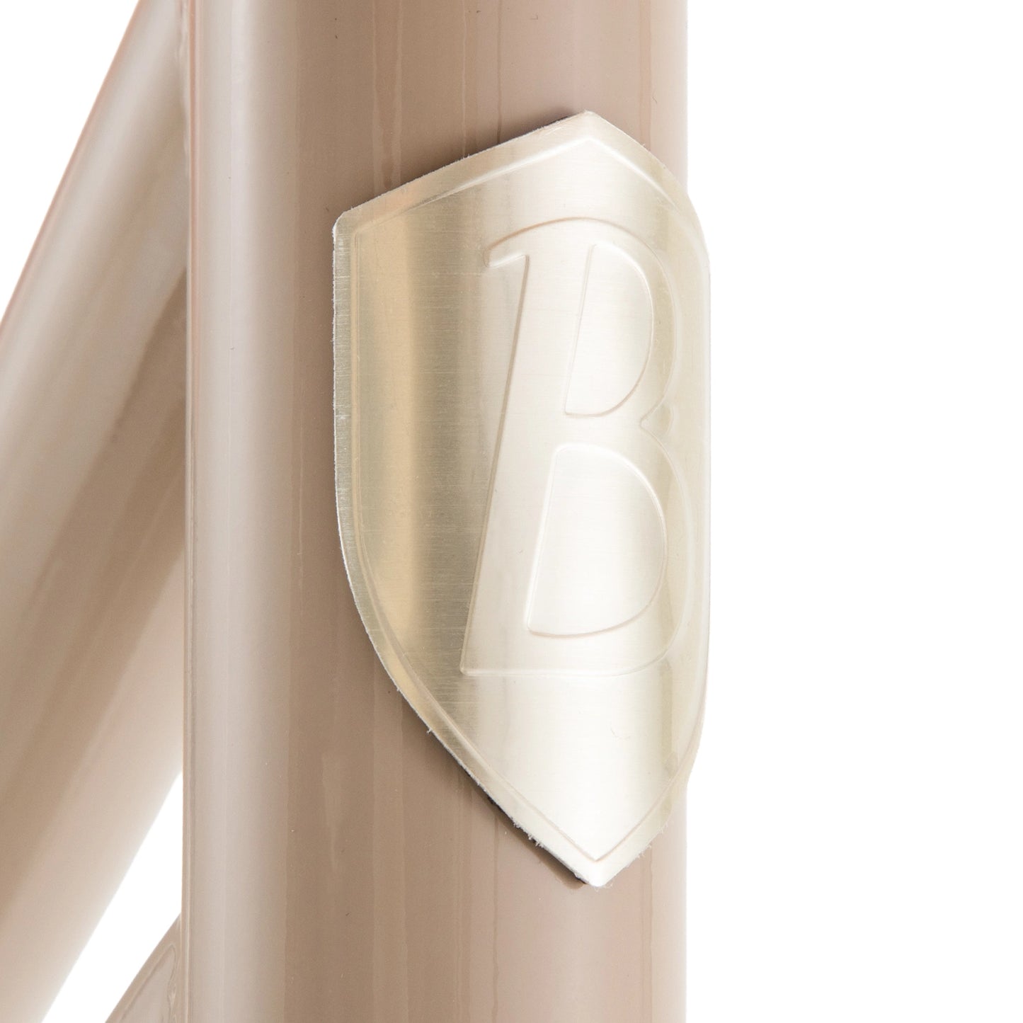 Shield-shaped light fixture on a wooden surface