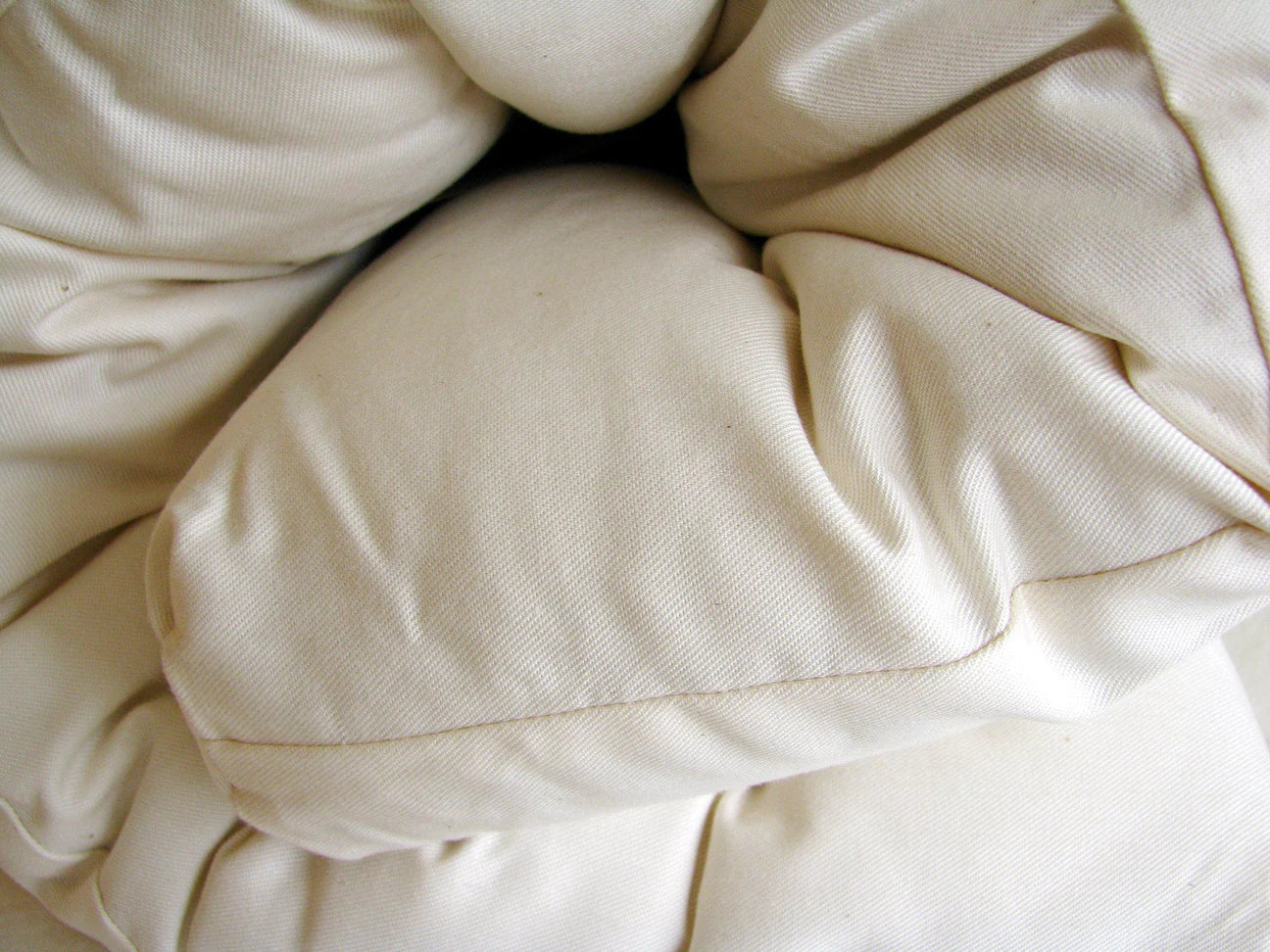 Close up of a Natural Changing Table Pad made from Organic Cotton and eco Wool 