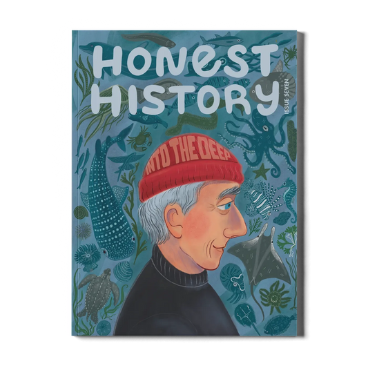 Children’s history magazine cover featuring Jacques Cousteau with ocean animals including sharks, rays, turtles, and coral