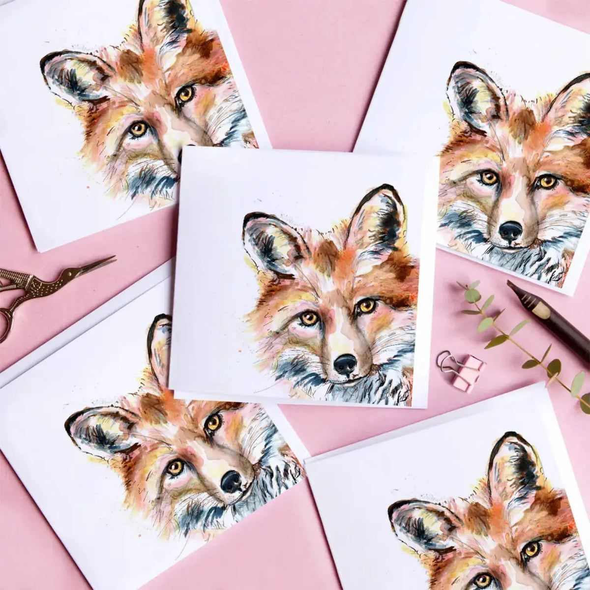 Kate Moby red fox greeting cards arranged on a pink background with stationery details