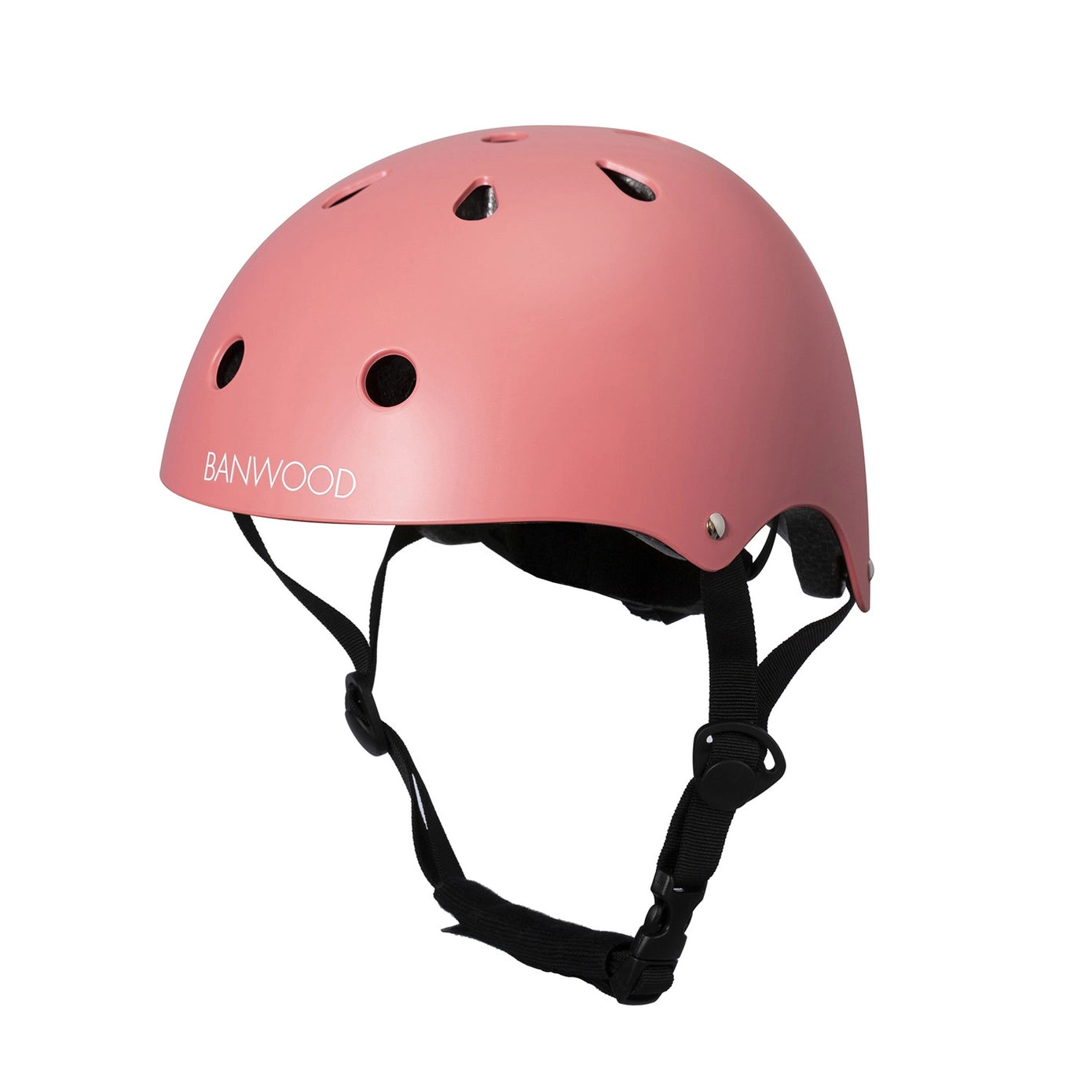 Pink bicycle helmet for kids with black straps on a white background