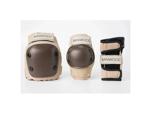 A set of Banwood protective gear including a knee pad, elbow pad, and wrist guard in beige and brown, displayed against a clean white background.