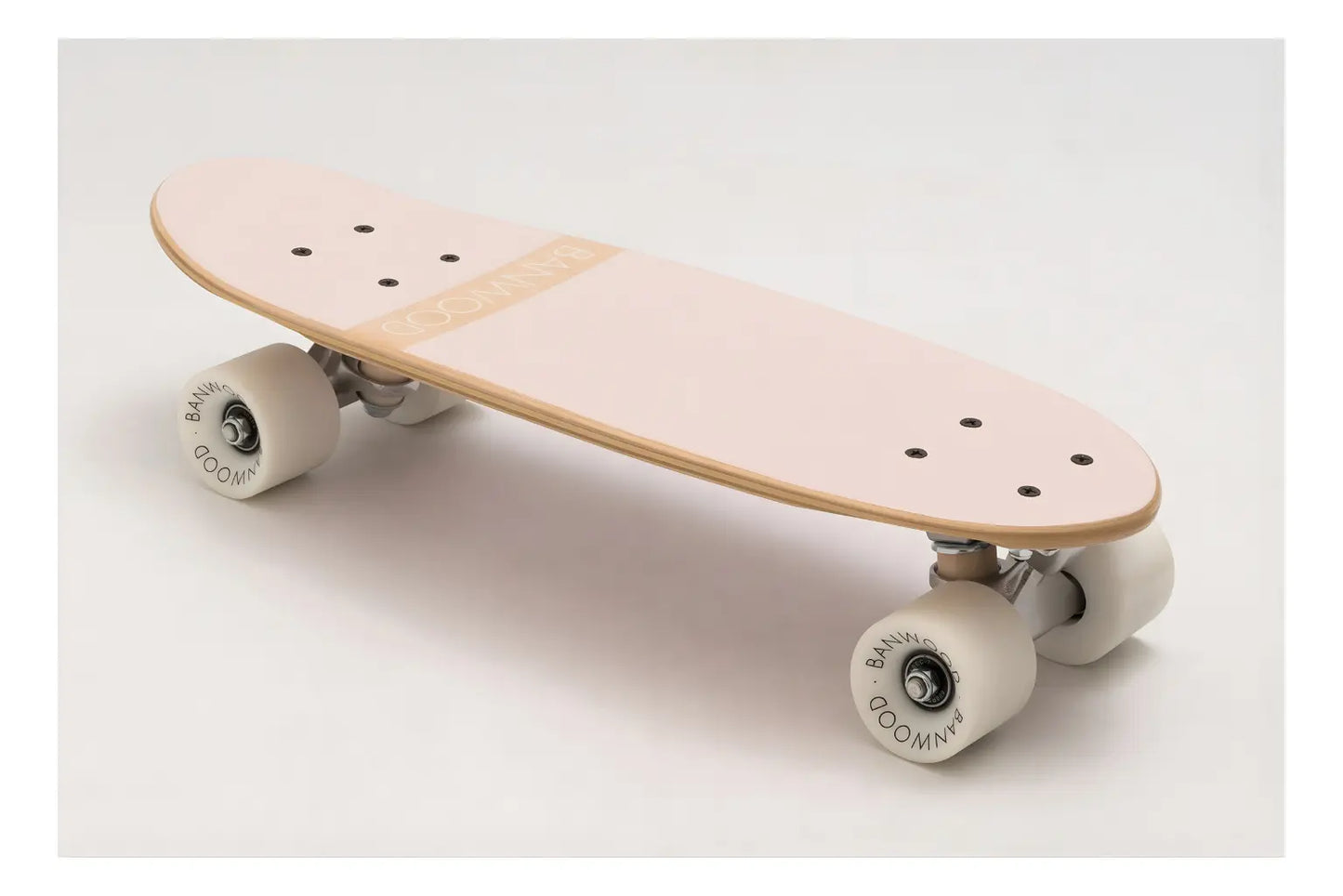 Skateboard with a wooden deck and white wheels on a light gray background