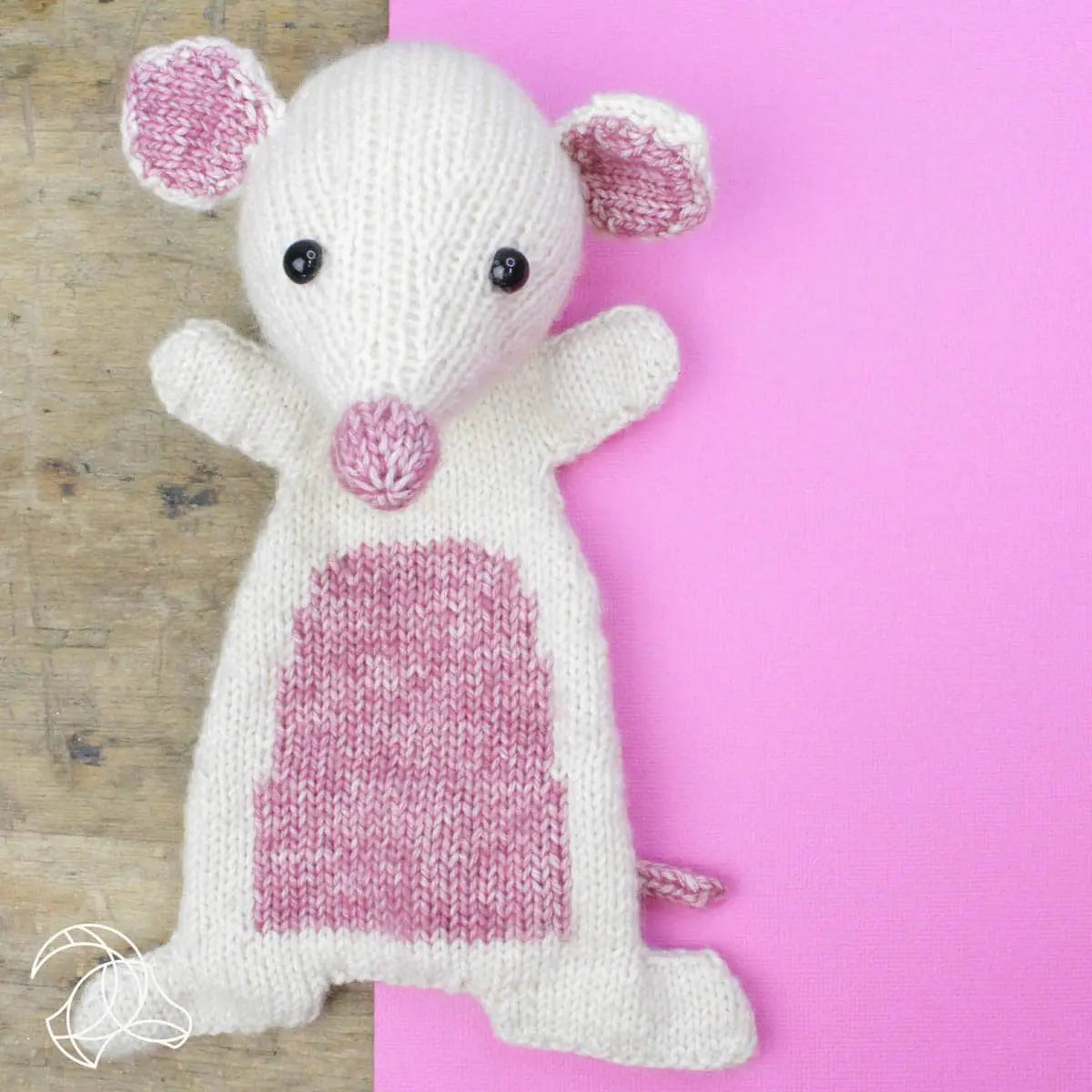 Handmade knitted mouse soft toy with pink ears and belly