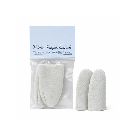 leather needle felting finger guards in retail packaging and next to it