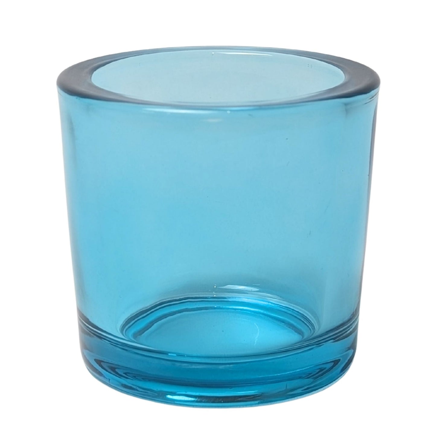 Blue glass tumbler on a white background