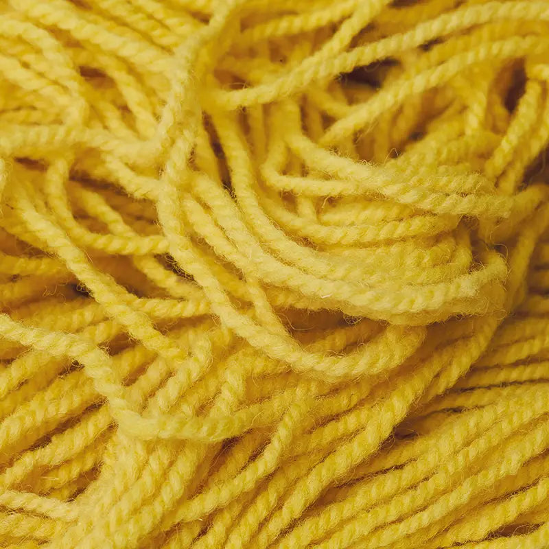 Organic plant-dyed Wool Yarn in light yellow close up