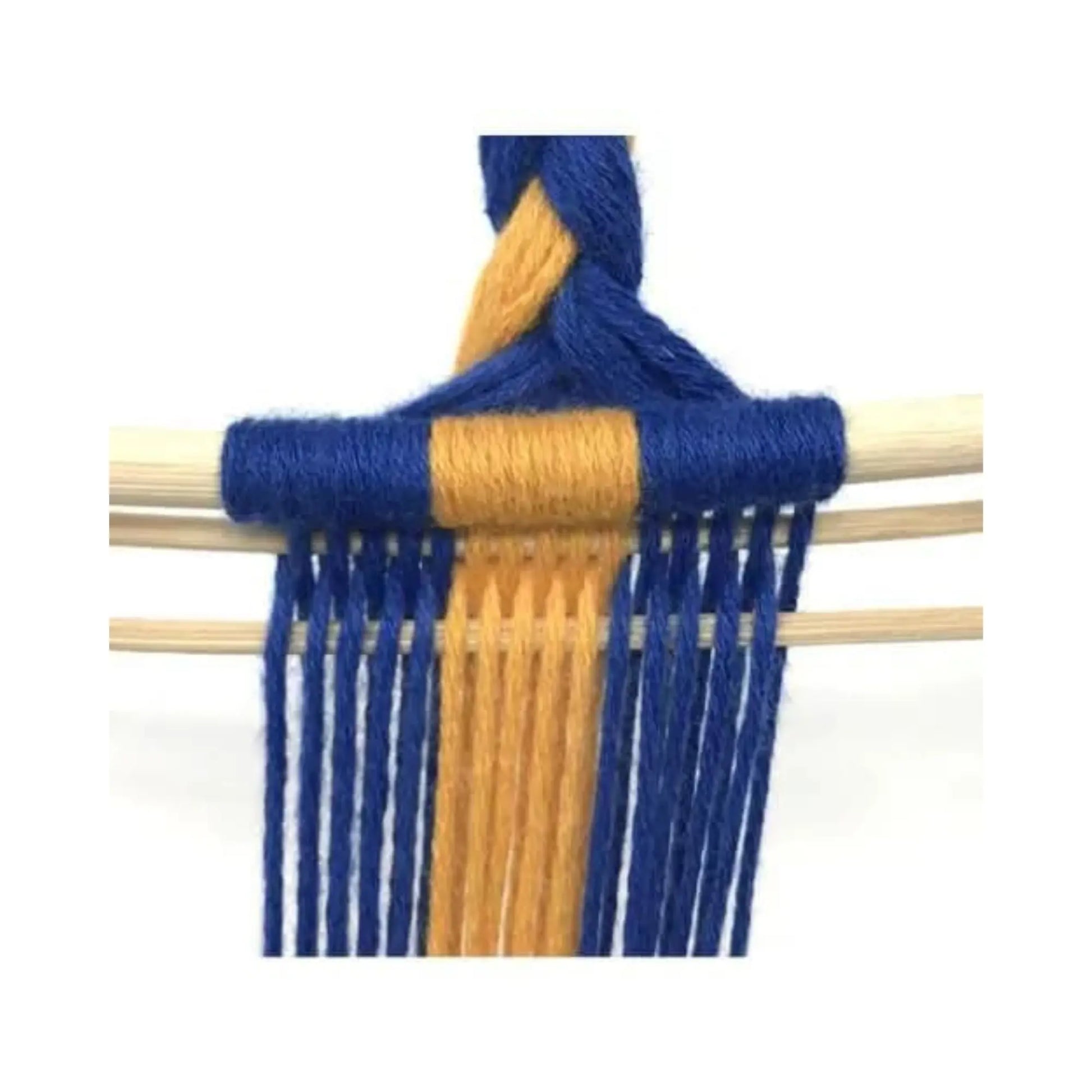 Close-up of blue and golden yellow yarn being woven without a loom on wooden sticks