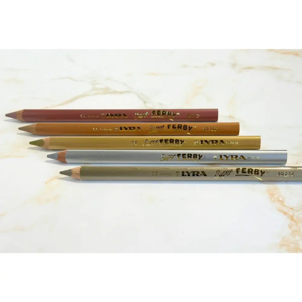 Set of LYRA pencils on a marble surface