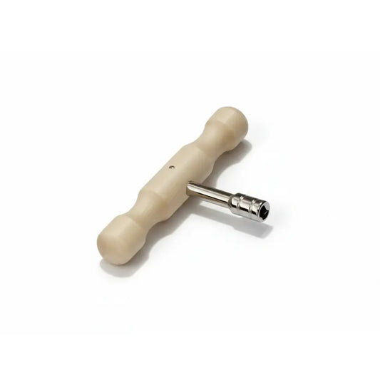 Auris tuning wrench that's a T-shape with a square hole on a white background