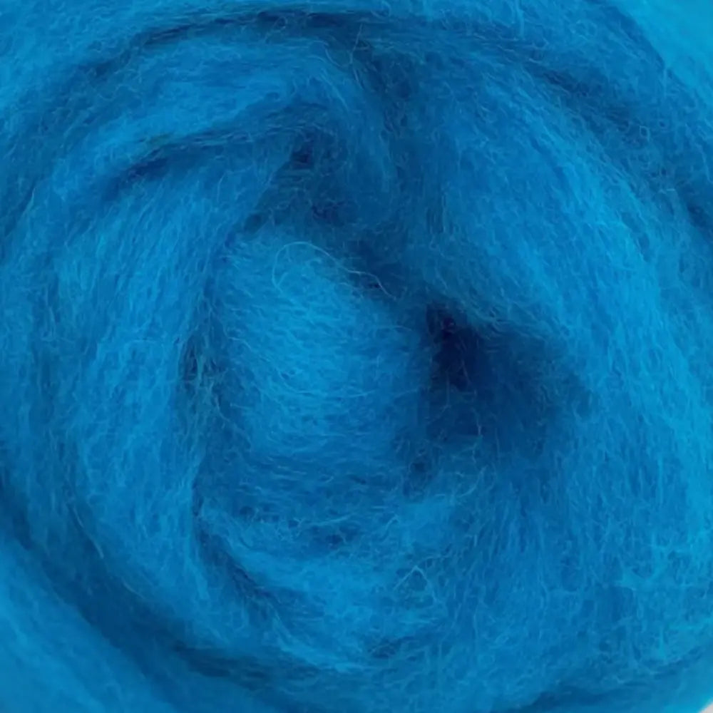 Close-up of blue wool roving with a blurred background