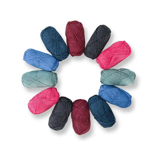 Assorted colorful yarn balls arranged in a circular pattern on a white background